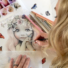 Painting a fairy flutterby 